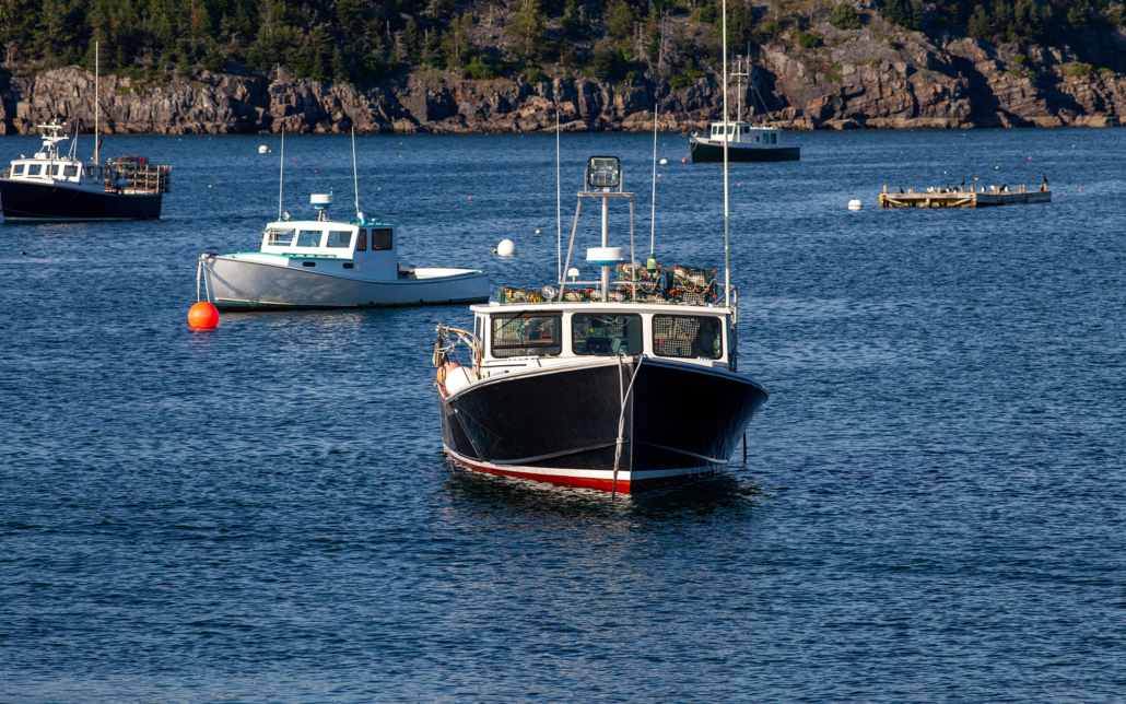 Multiple Work Boats On The Water